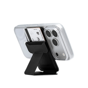 Peel Magnetic Wallet Stand in black holding a card and propping up a clear iPhone case