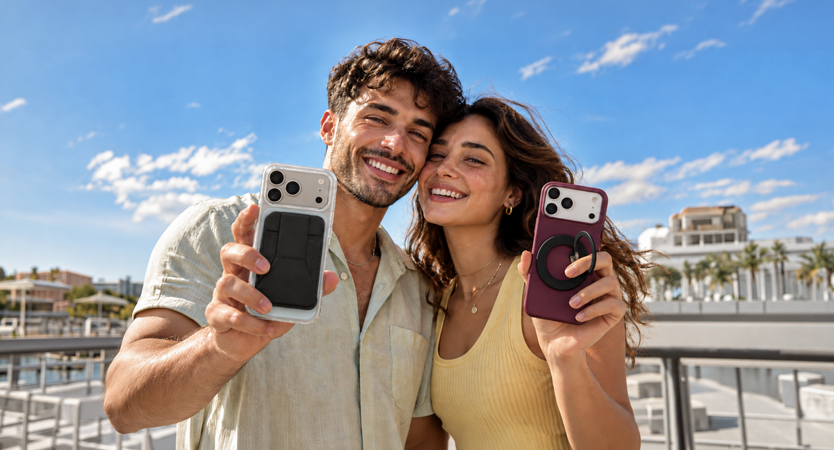 Two friends holding up their phones in Peel cases with a MagSafe wallet and ring grip
